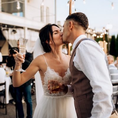 wedding ceremony of a young couple in love on a green meadow